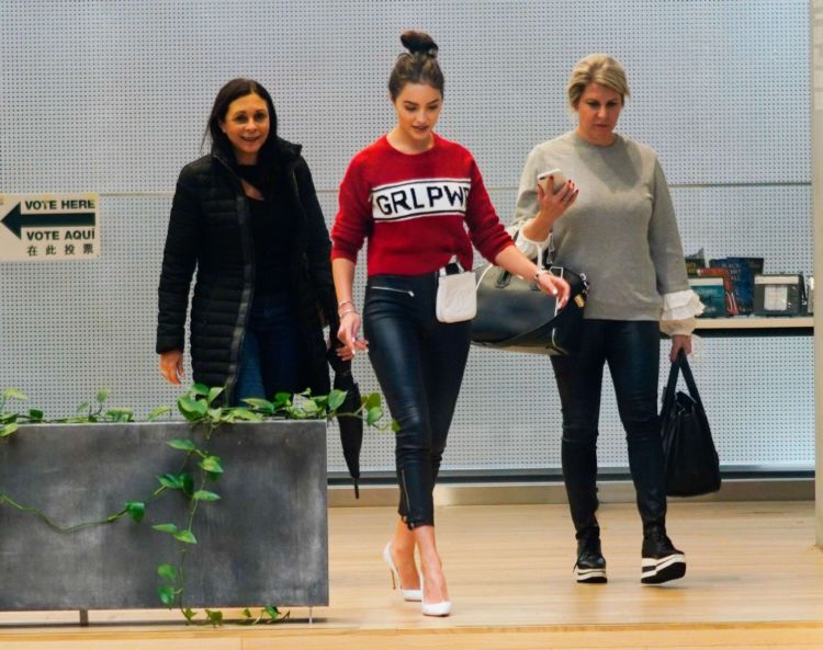 Olivia Culpo Out In Red And Black Outfit In New York